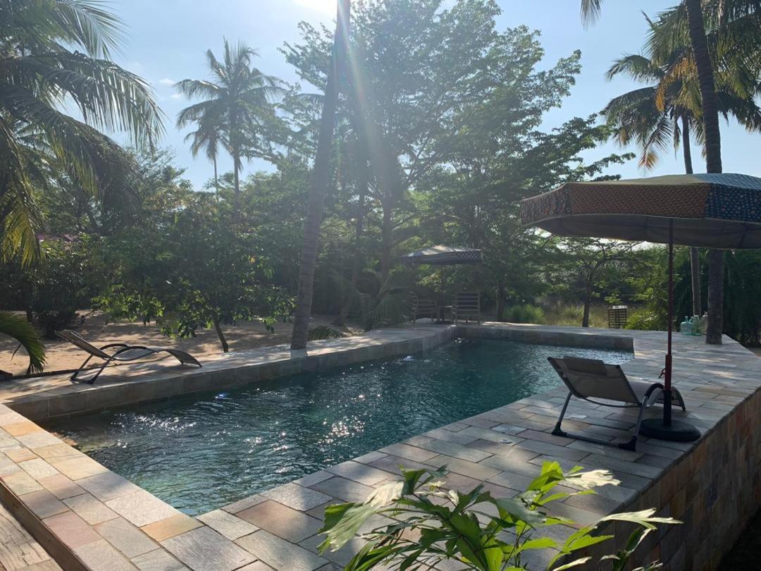 Dolce Ouidah Lodge ภายนอก รูปภาพ